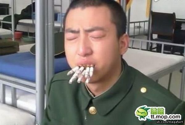 Таким образом отучивают курить в китайской армии. Сначала 